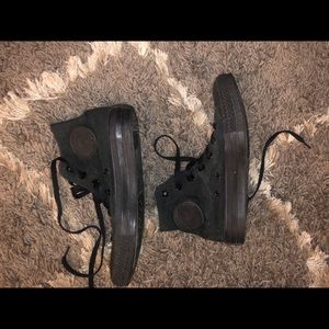 Converse Chuck Taylor. Black on black high tops.